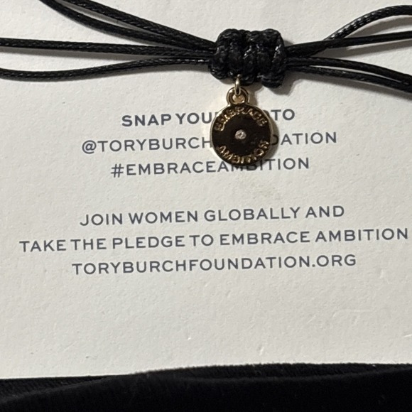 Tory Burch Foundation Embrace Ambition Bracelet Black
with Gold Tone Logo Accent - Picture 4 of 4